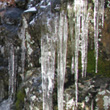 Icicles Hanging from Rock