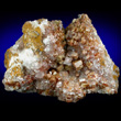 Orange-brown Vanadinite on Calcite